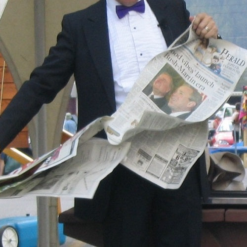 Newspaper Tear Restore Magic Trick